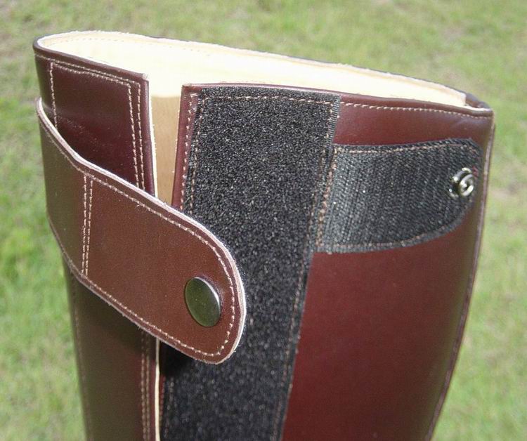 Side velcro closure with velcro-snap buckle to secure.